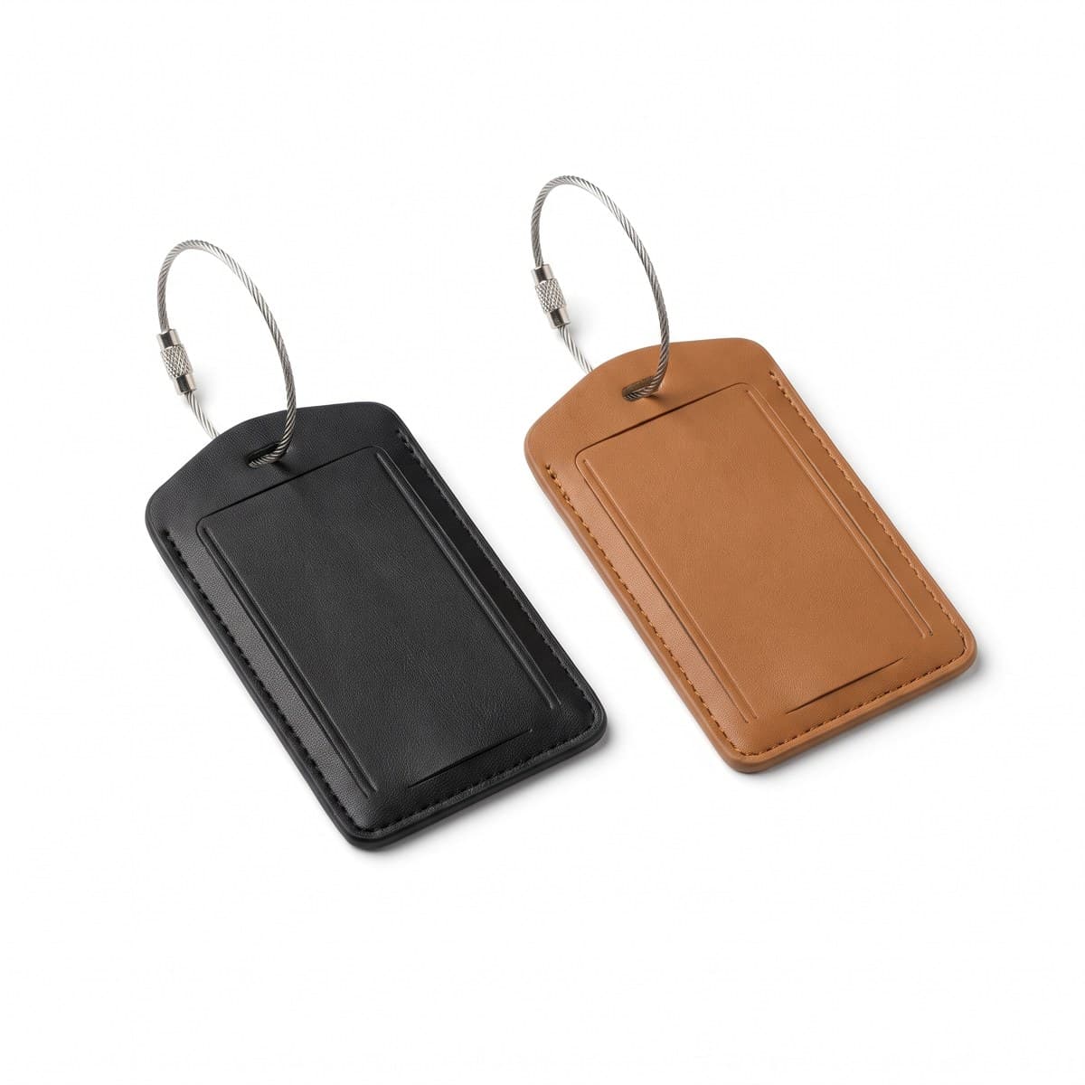 Two vegan-leather luggage tags, one black and one tan, each with a covered name card and a steel loop strap